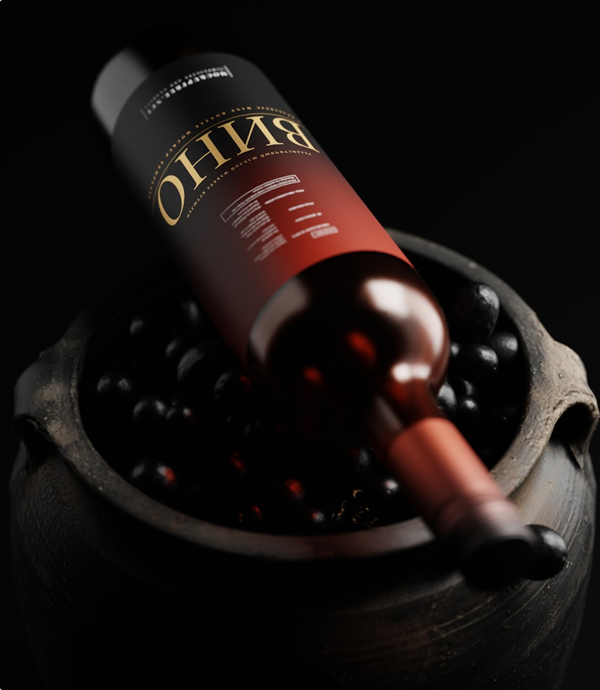 Red wine bottle resting on dark berries in a stone bowl against a black background