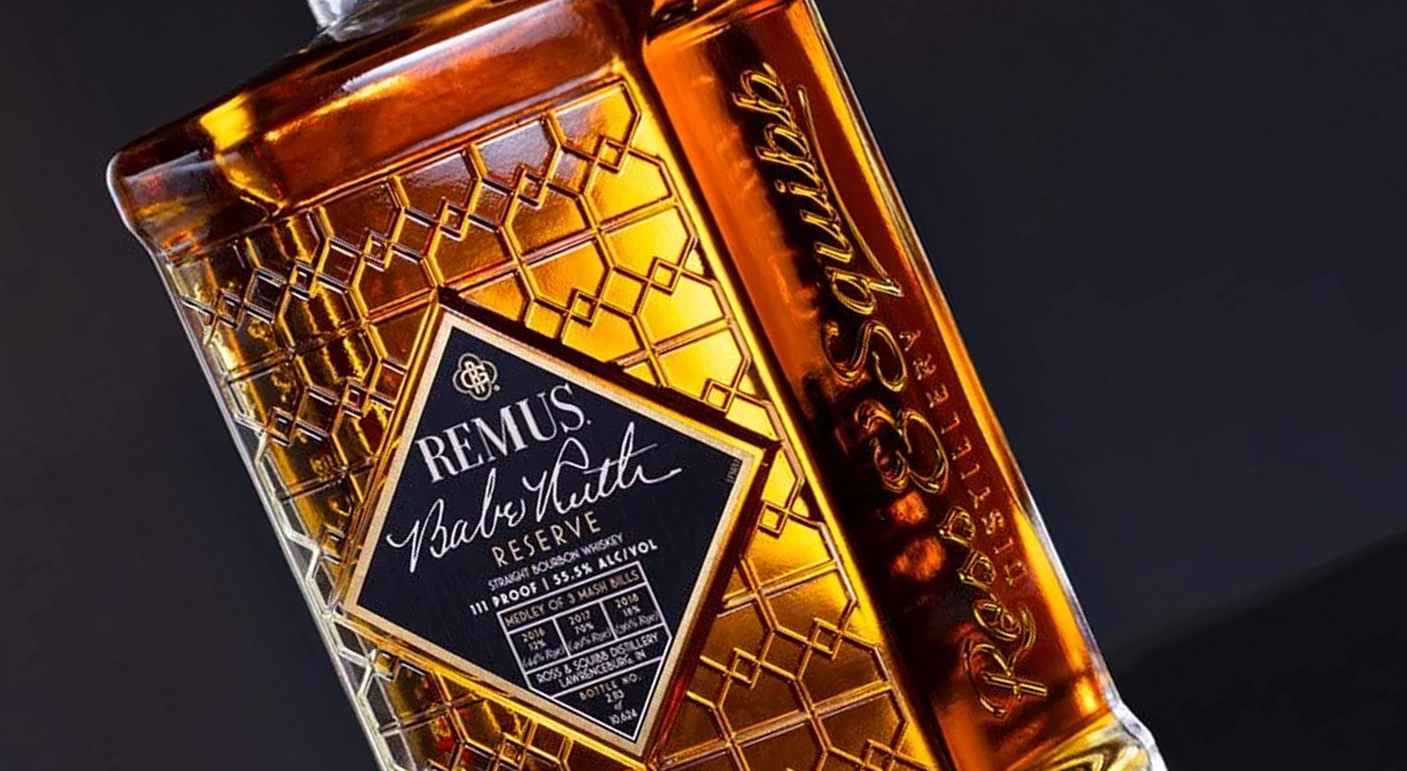 Amber Remus bourbon bottle with geometric glass pattern