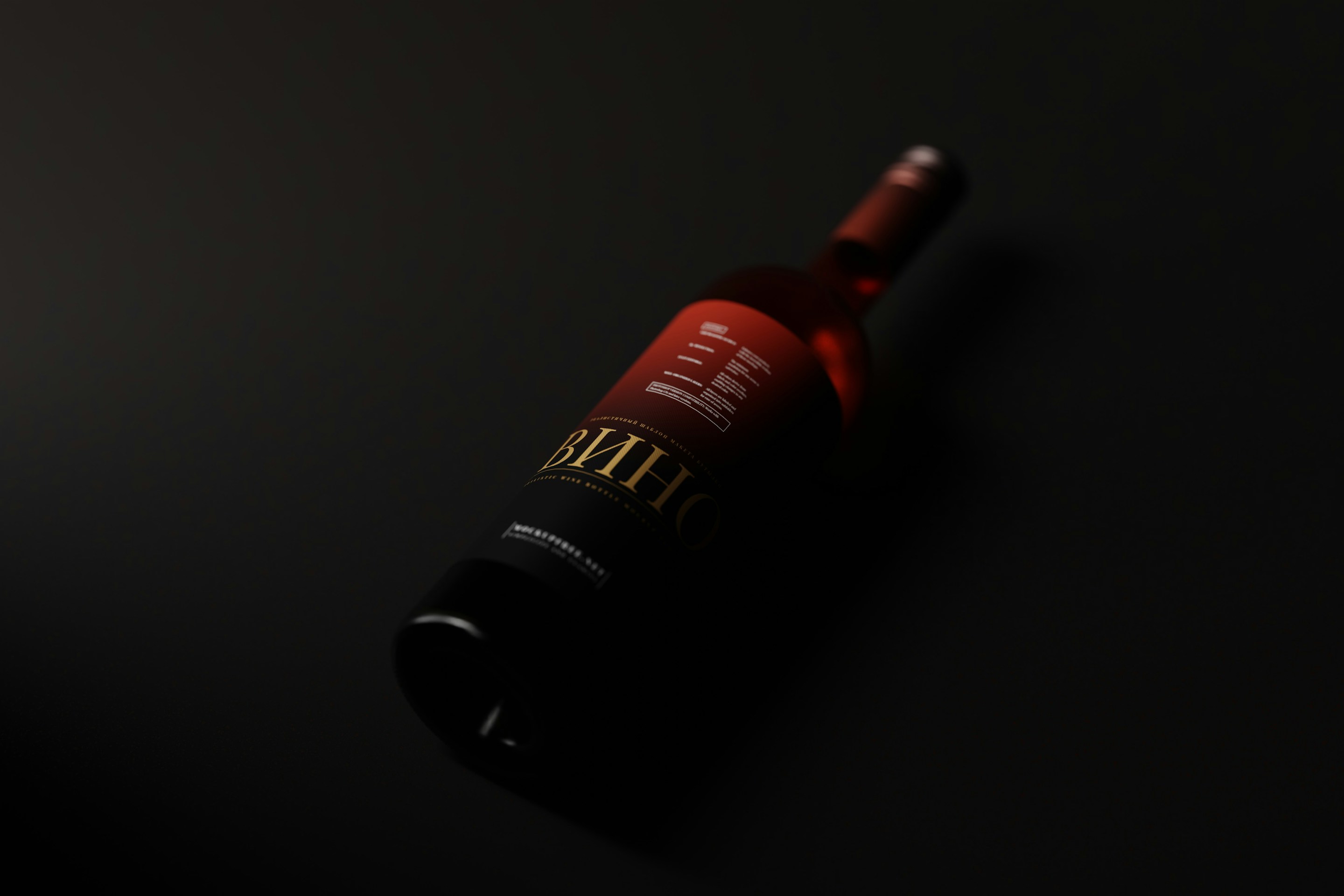 Dark red bottle lit against a black background