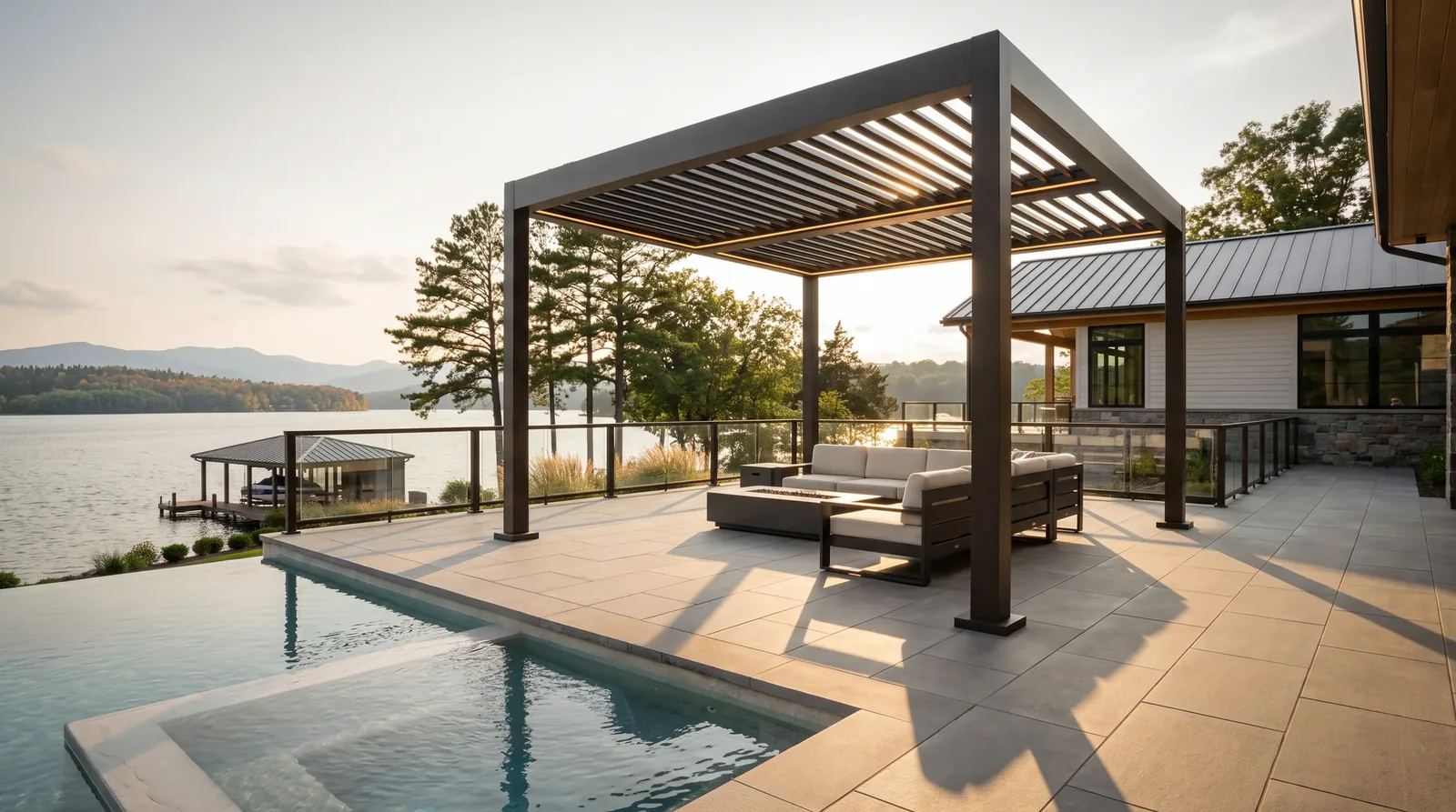 Motorized louvered pergola over a poolside fire table lounge overlooking Smith Mountain Lake near Moneta VA