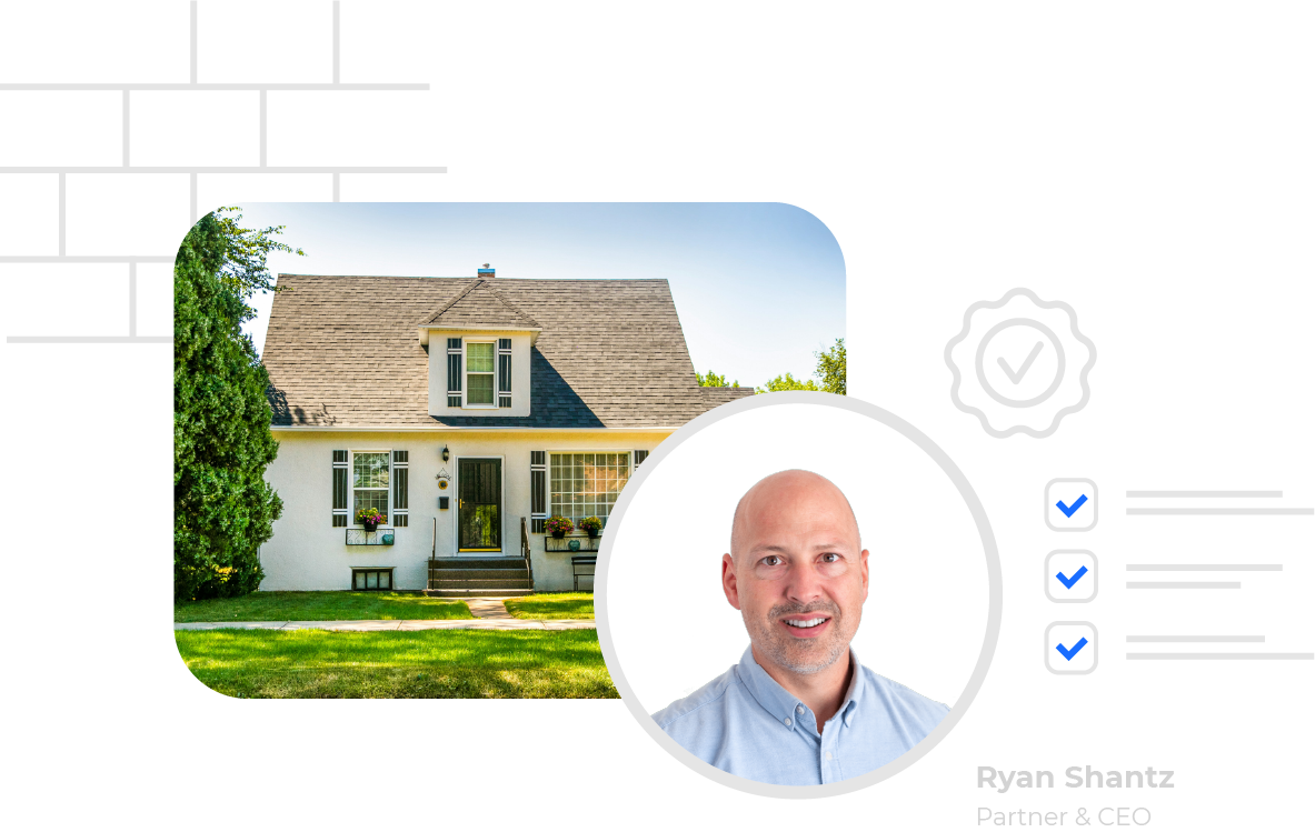 Two-story white house with a gray roof and lawn beside a portrait of a smiling bald man in a light blue shirt.