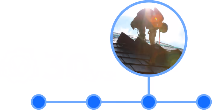 Worker wearing a safety harness installing shingles on a roof in bright sunlight.