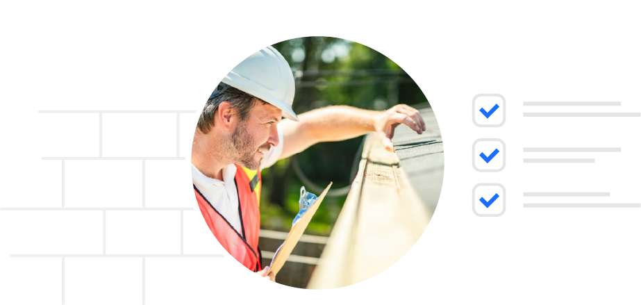 Construction worker in a white hard hat and orange safety vest inspecting a roof while holding a clipboard.
