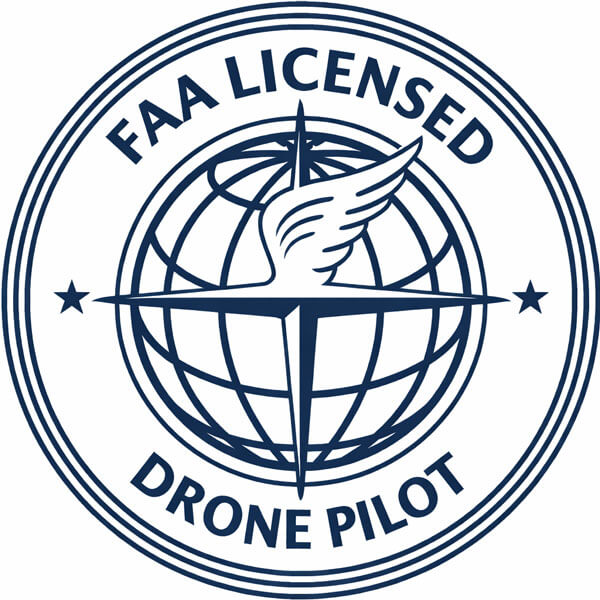 FAA licensed drone pilot seal featuring a winged compass on a globe with stars, indicating authorized drone operation.