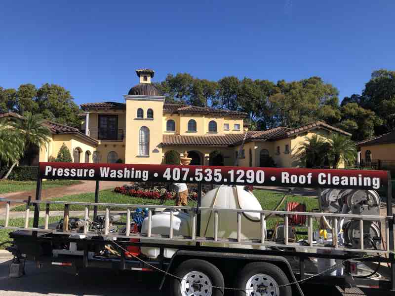 Clean residential roof in Central Florida showing difference between proper fall cleaning timing versus delayed summer service