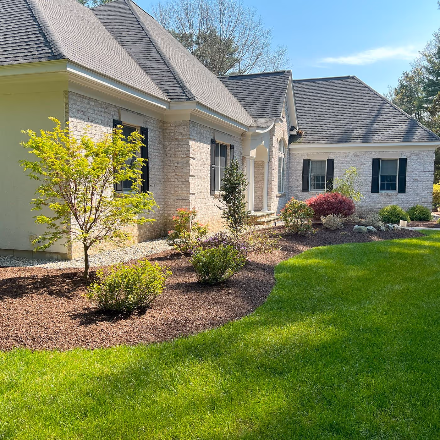 Landscaping near me fresh mulch and shrub pruning