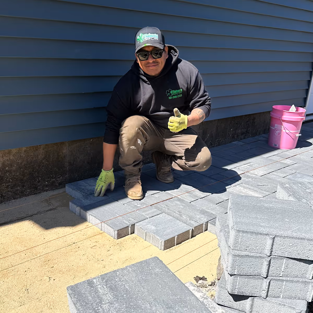Custom paver patio installation by OFlaherty Lawn Care in Attleboro Massachusetts near me