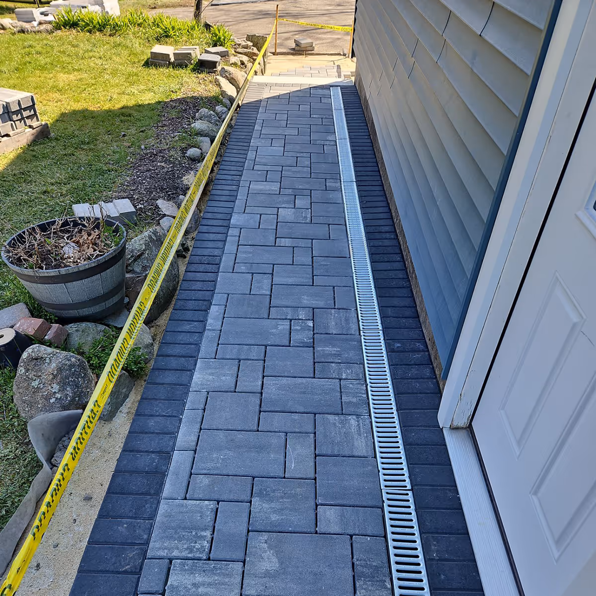Stone walkway installation by OFlaherty Lawn Care near me