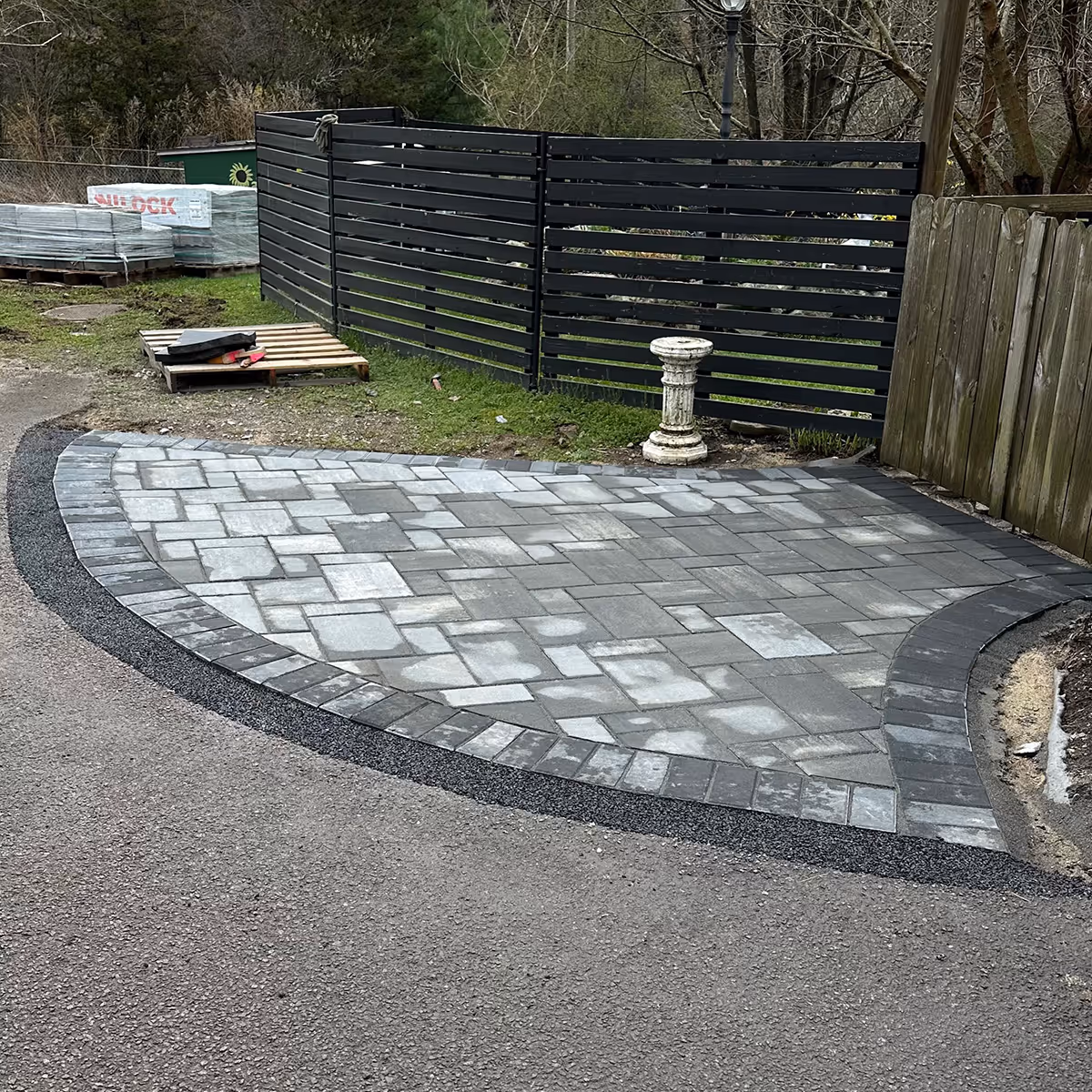 Completed custom paver patio project by OFlaherty Lawn Care in Attleboro Massachusetts near me