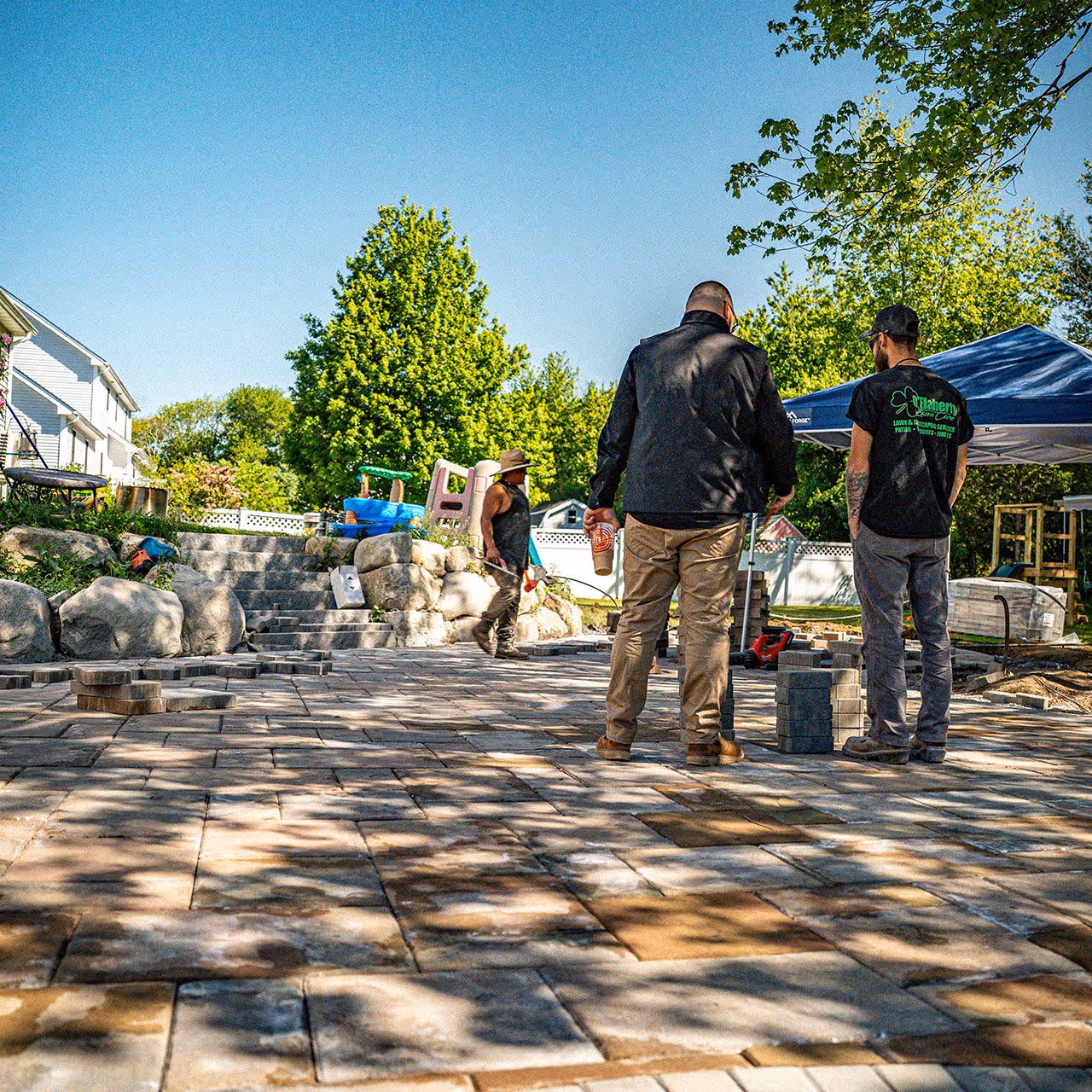 Beautiful outdoor living space with custom hardscaping by OFlaherty Lawn Care in Attleboro Massachusetts near me