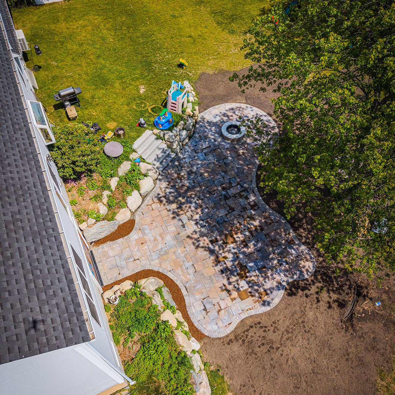 Aerial view of completed landscaping and hardscaping project by OFlaherty Lawn Care in Attleboro Massachusetts near me