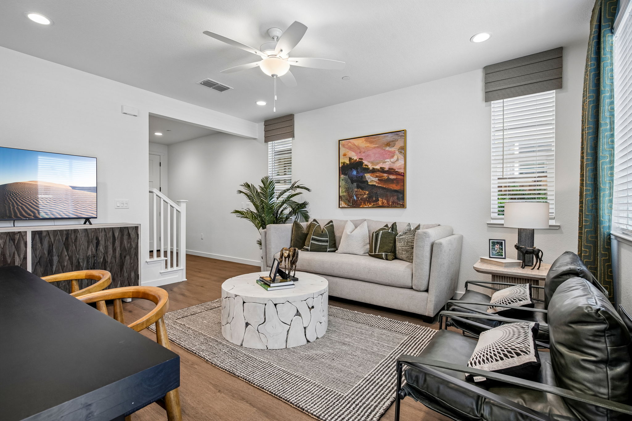 Living area with sofa, tv, and coffee table