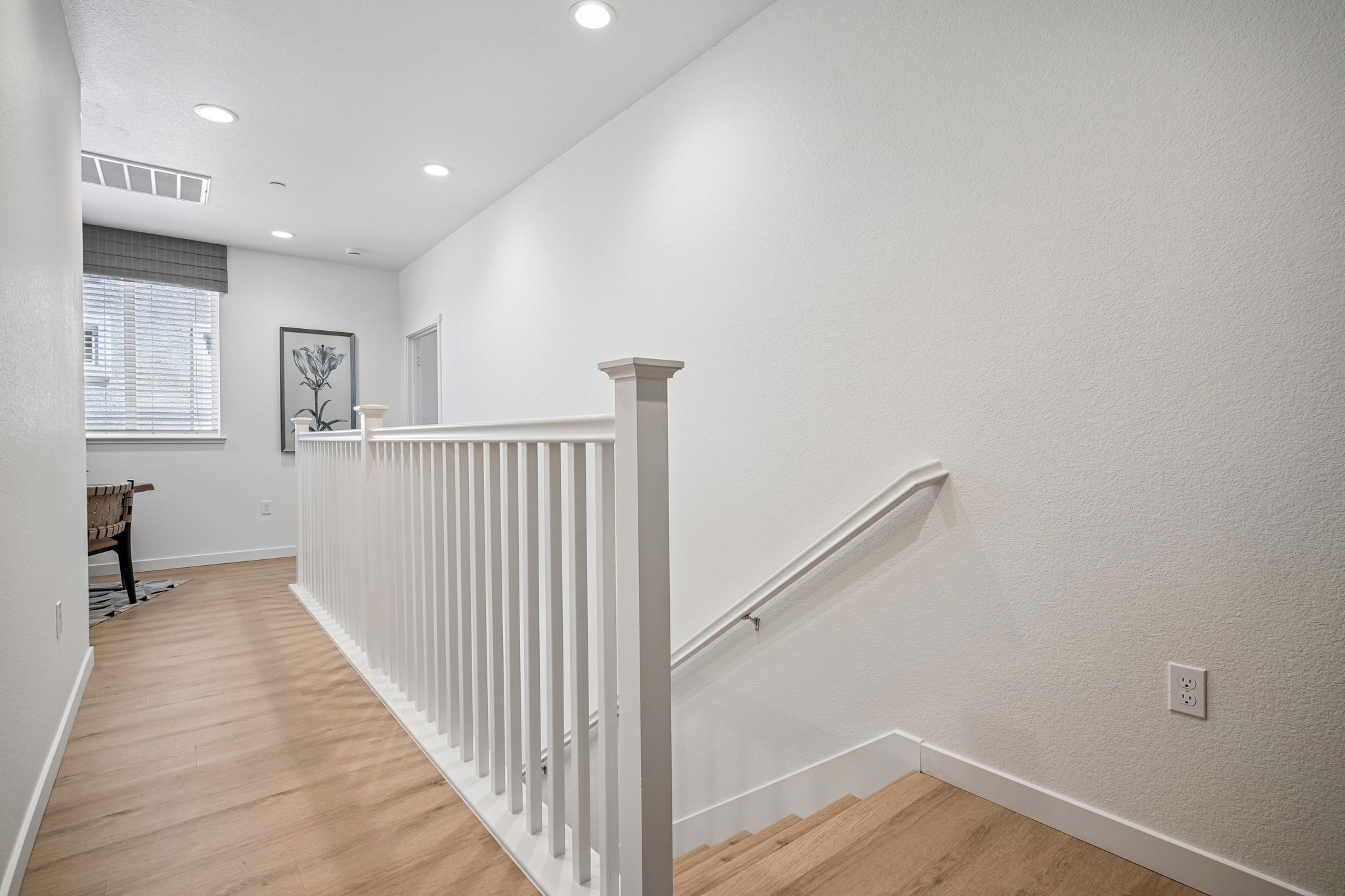sStairs and view of hallway on second floor