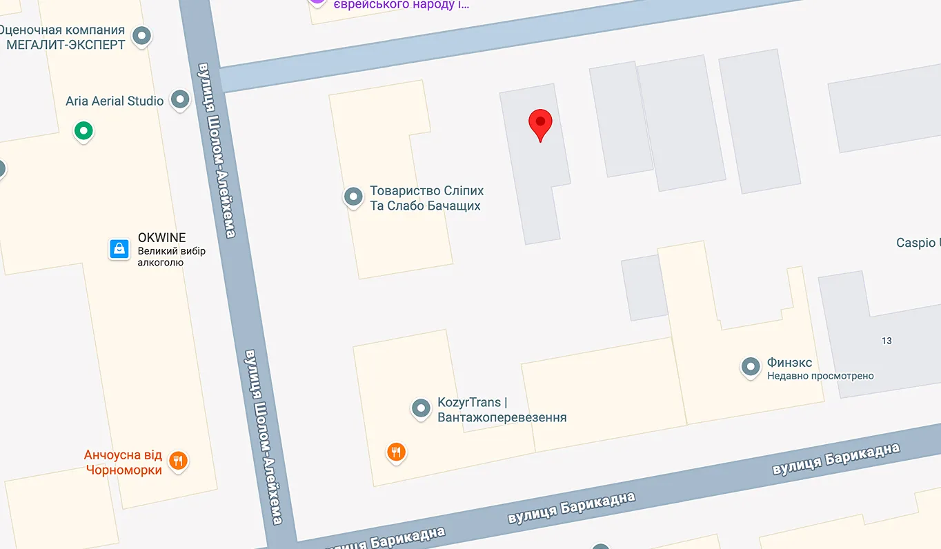 A fragment of the map with the streets of Sholom Aleichem and Barricadna and the designations of places such as OKWINE, the Society of the Blind and Visually Impaired, KozyrTrans, and the restaurant Anchousna from Chernomorka.