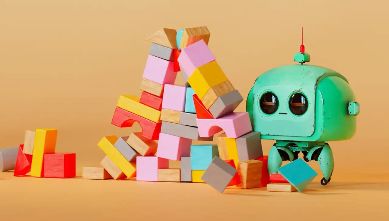 A small green retro-style robot with large round eyes sits next to a colorful pile of stacked wooden toy blocks in pink, yellow, red, gray, and blue tones, set against a warm beige background.