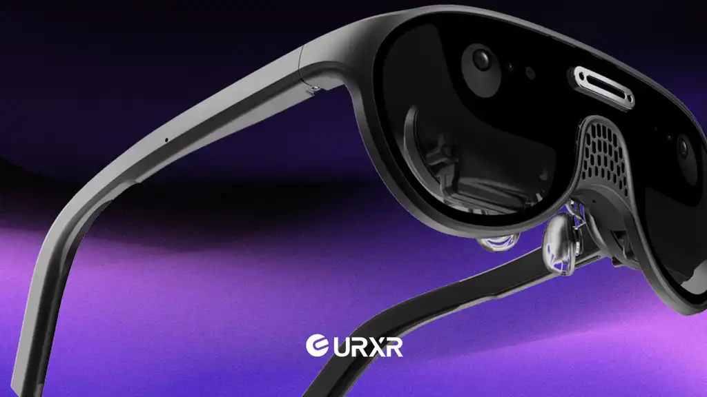 URXR One lightweight spatial display glasses shown in close-up profile against a purple background, with visible pancake lens optics, front tracking cameras and side vent.