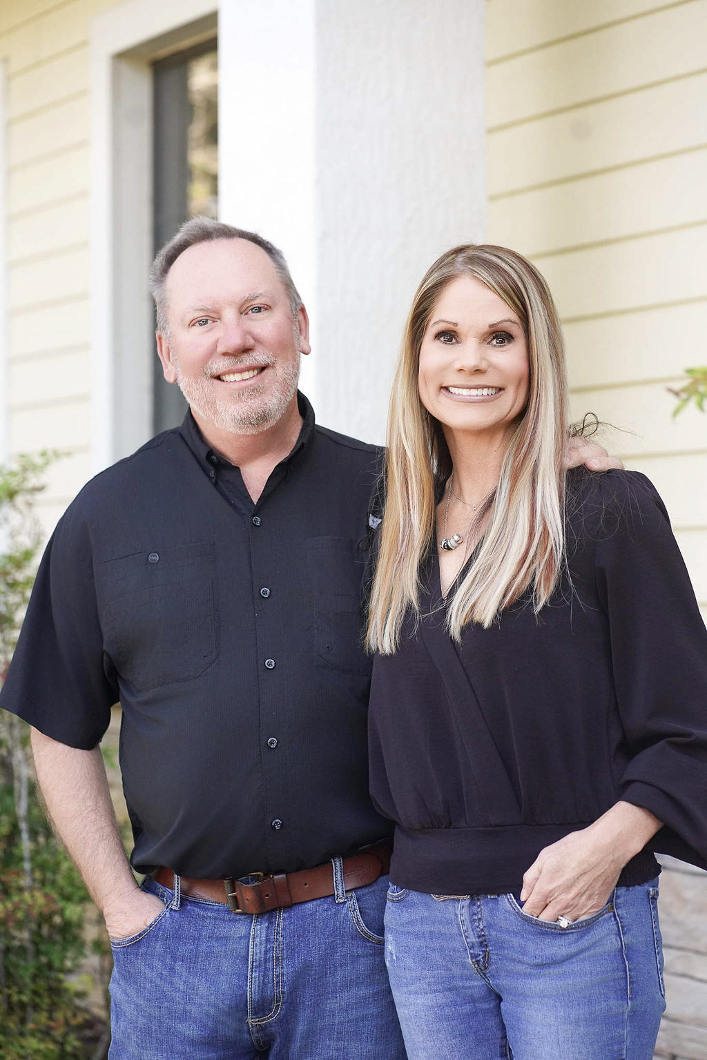 Dr. Robert Ogden with a member of the Ogden Orthodontics team outside the practice