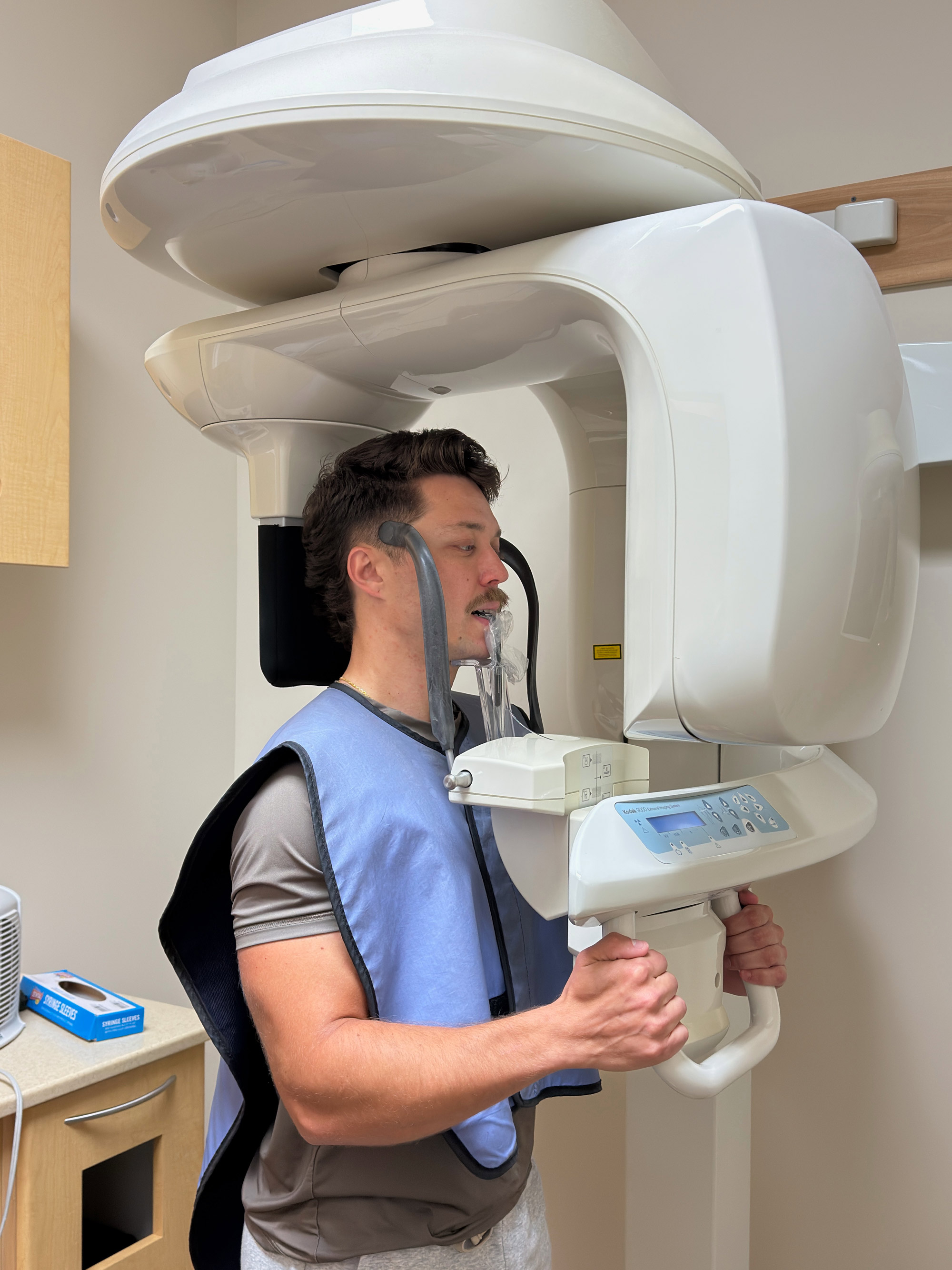 Invisalign patient having a panoramic x-ray taken during a first visit at Ogden Orthodontics in Mount Dora
