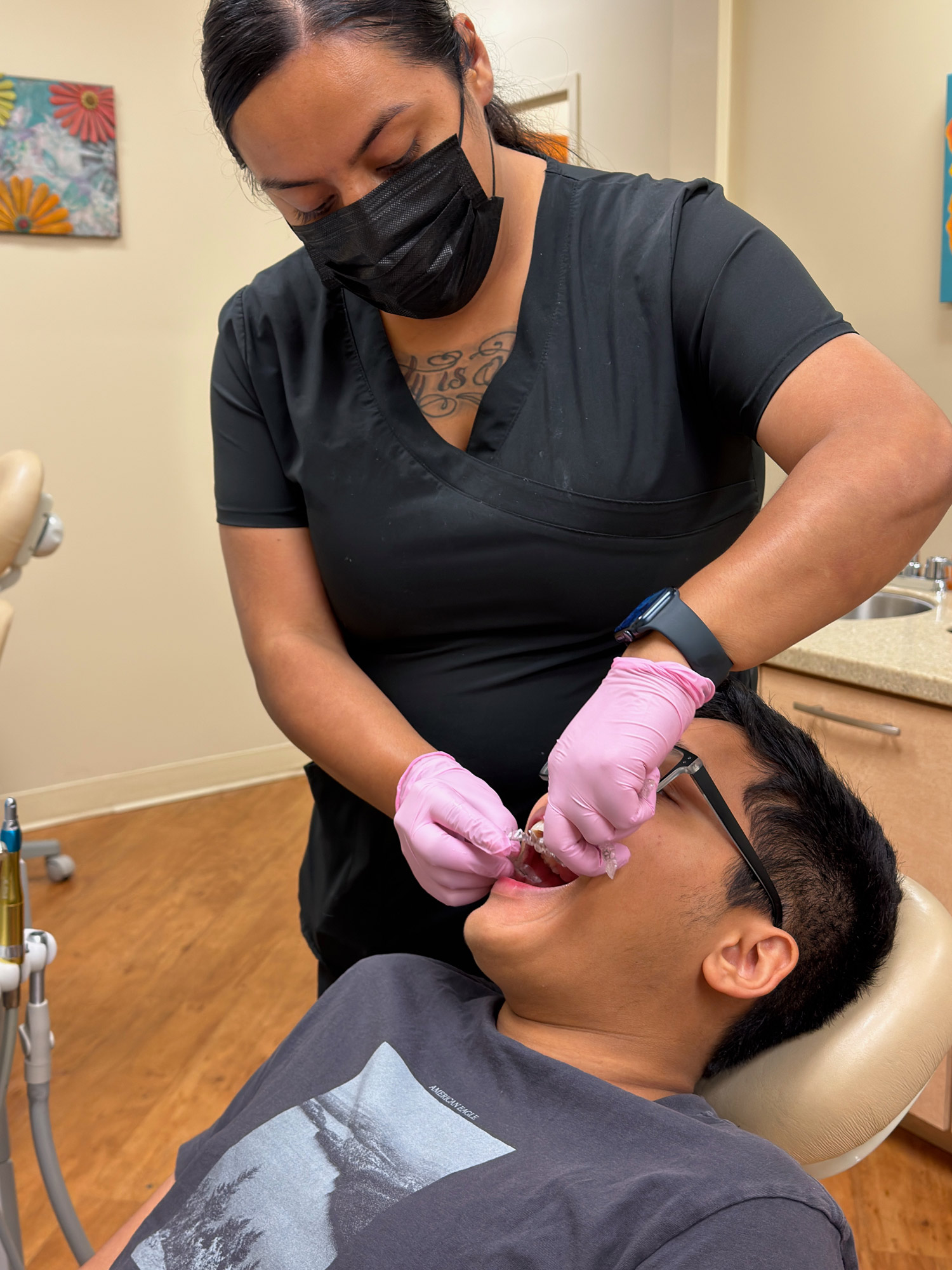 Clear aligner being fitted for a patient at the Ogden Orthodontics Windermere office