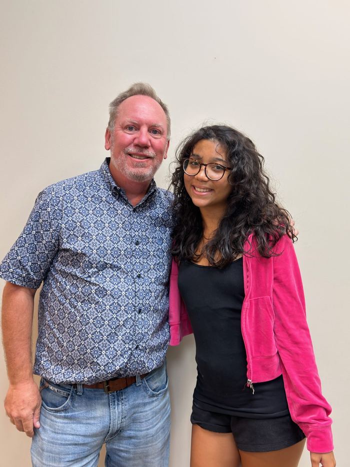 Dr. Robert Ogden with a patient who has finished orthodontic treatment