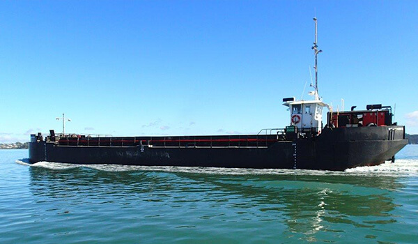 A self-propelled split hopper barge