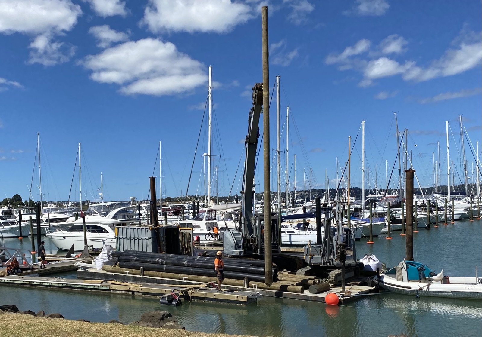 Empire Marine piling barge working alongside a marina berth