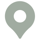 Gray map pin icon with a hollow center on a white background.