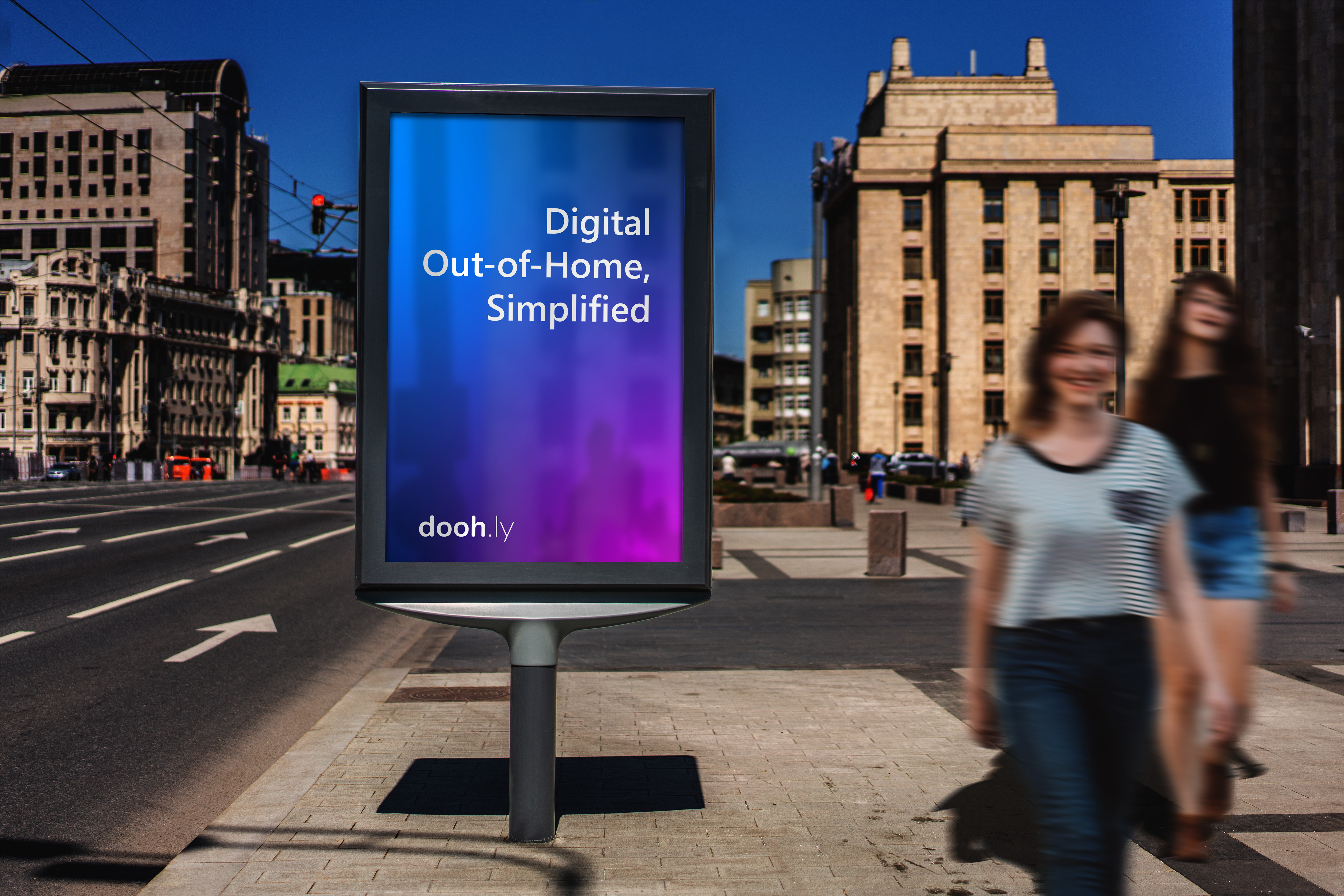 women walking away from Doohly digital signage