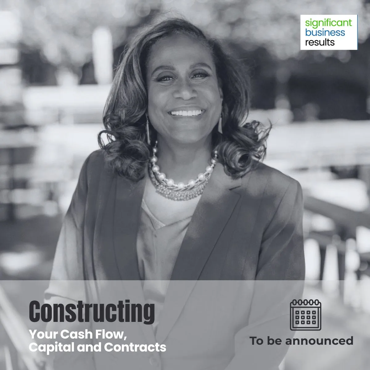 Smiling woman in business attire with pearl necklace, overlaid text about constructing cash flow, capital, and contracts with date to be announced.