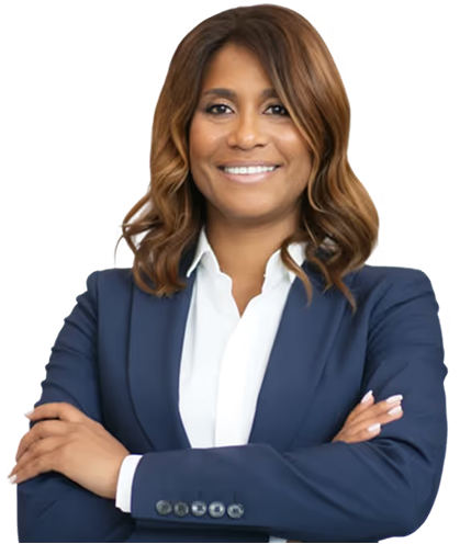 Confident woman with shoulder-length wavy hair wearing a navy blazer and white shirt, smiling with arms crossed.