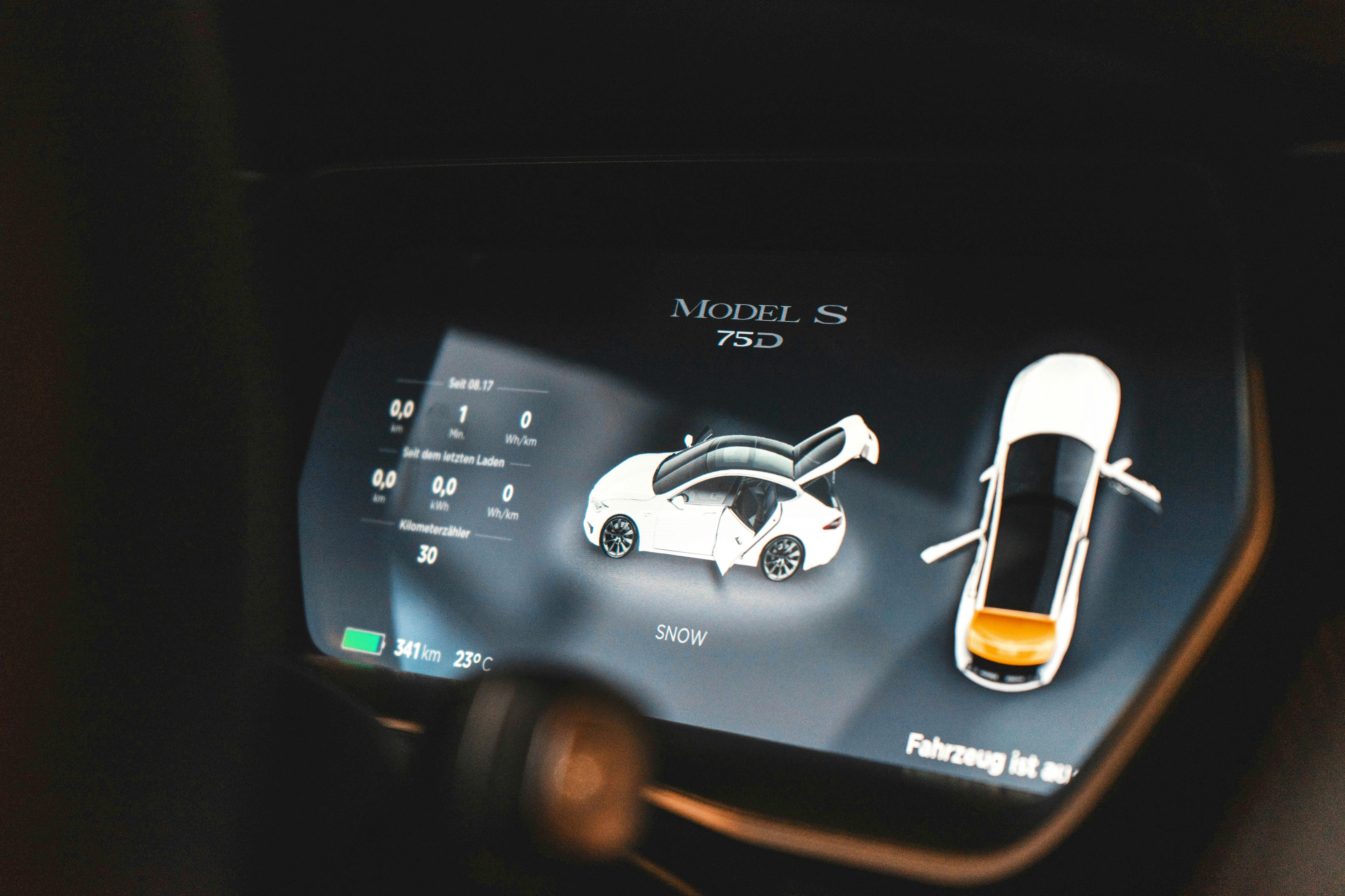 An image of the user interface of a Tesla electric vehicle