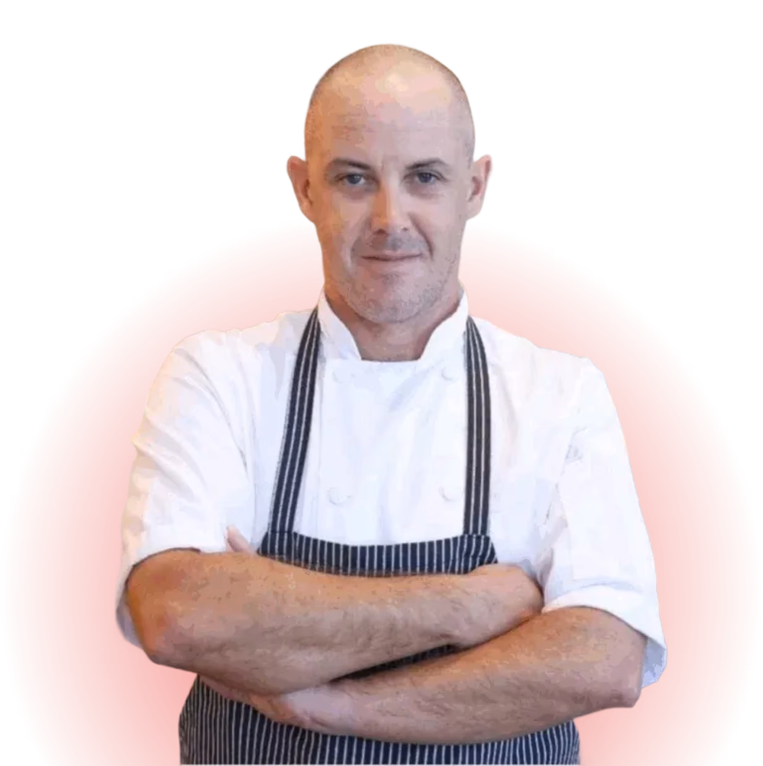 Chef in white uniform with arms crossed against a red circle background