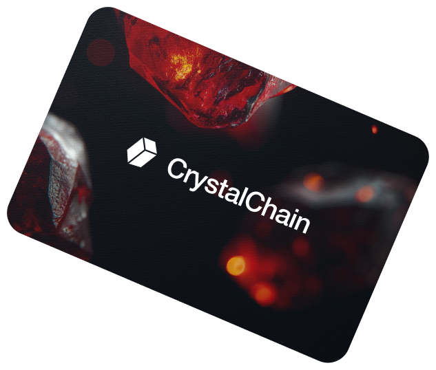 Card tilted at an angle with red crystals and white CrystalChain logo on a black background.