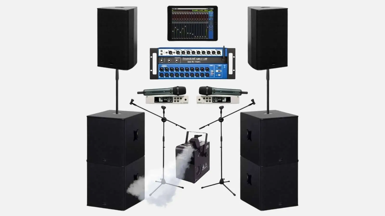 Seeburg Konzert-PA-Set mit Tops, Subwoofern, Soundcraft-Ui24R-Mischpult, Funkmikrofonen und Nebelmaschine vor weißem Hintergrund.