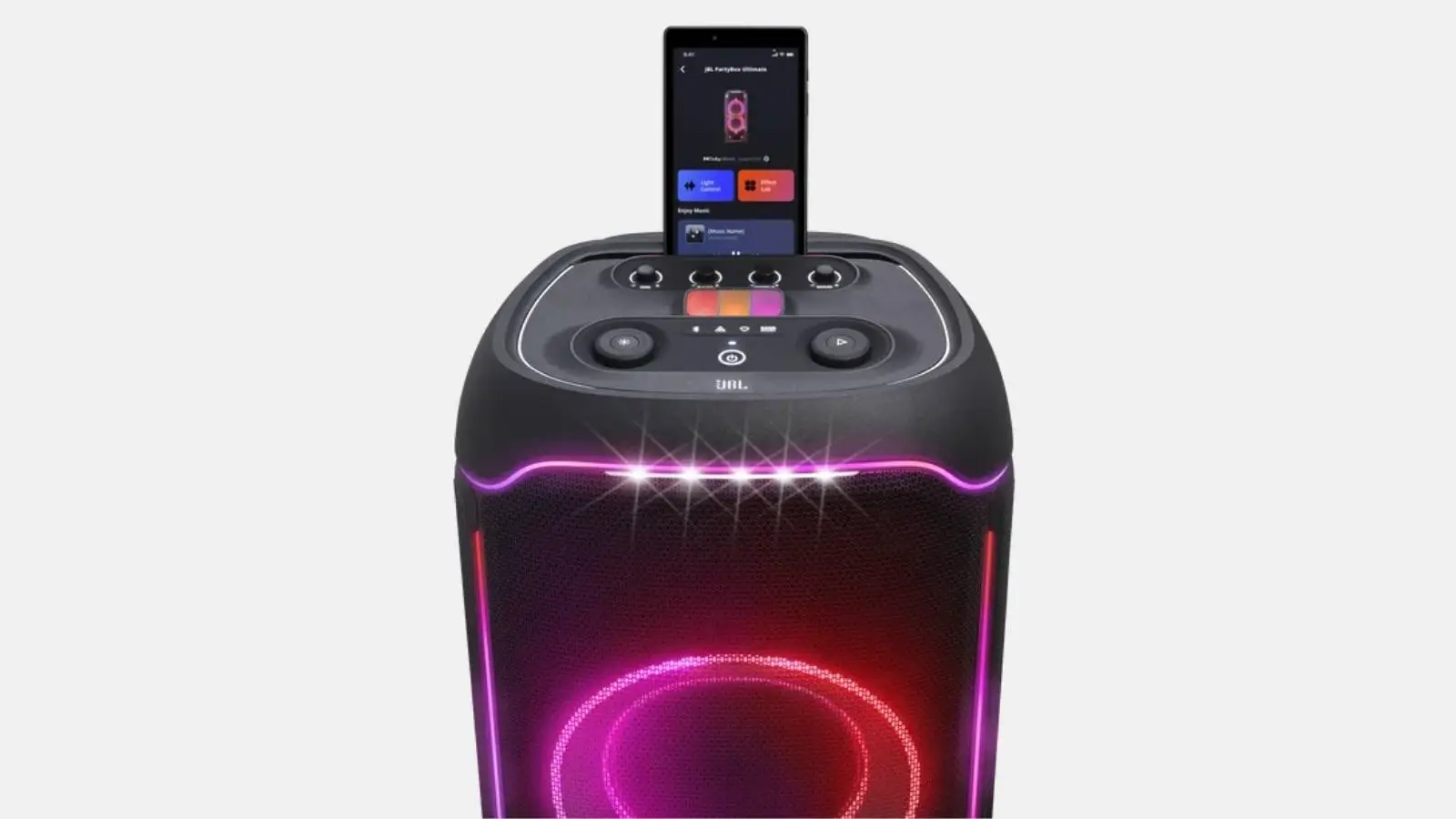 JBL PartyBox Ultimate Party-Lautsprecher mit Lichtshow und aufgestecktem Smartphone am Bedienfeld.