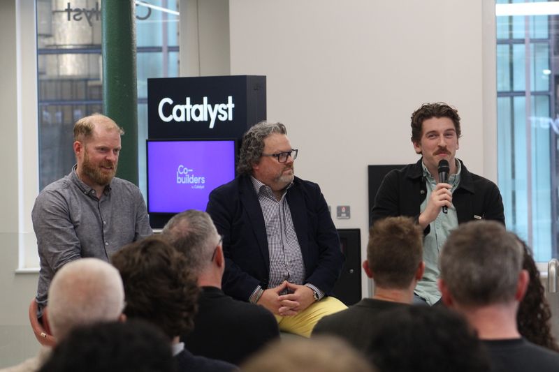 Martin Naughton listening as another panellist speaks at Catalyst.