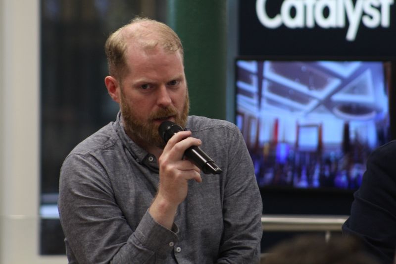 Portrait view of Martin Naughton speaking at the Catalyst AI panel.
