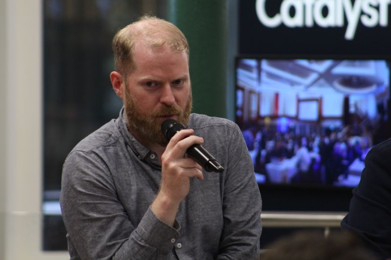 Close view of Martin Naughton speaking at the Catalyst AI panel.