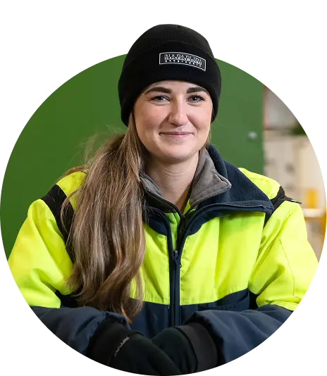 a woman wearing a hat and jacket