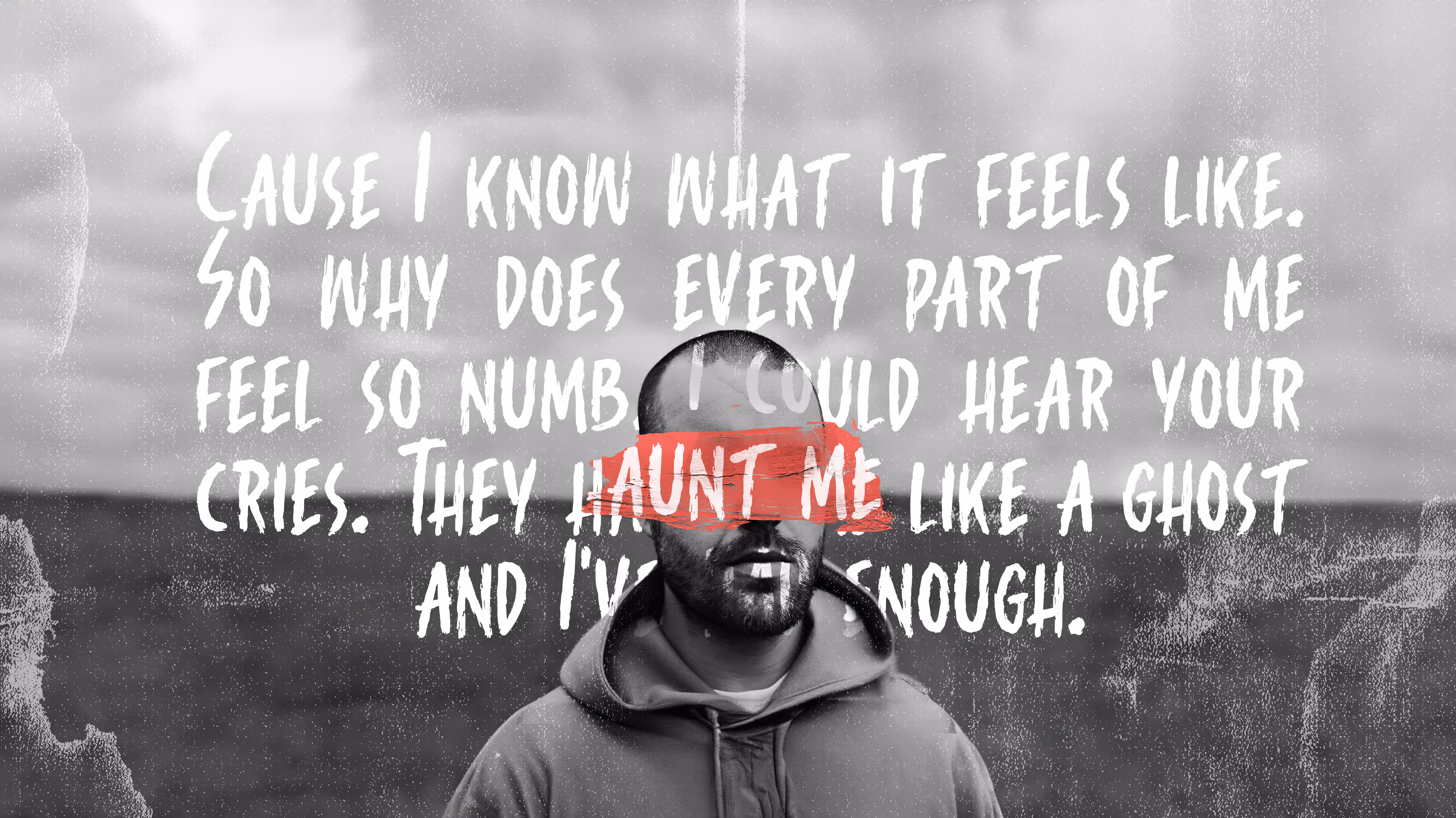 Pair of black wireless earbuds with red translucent tips floating against a dark background.