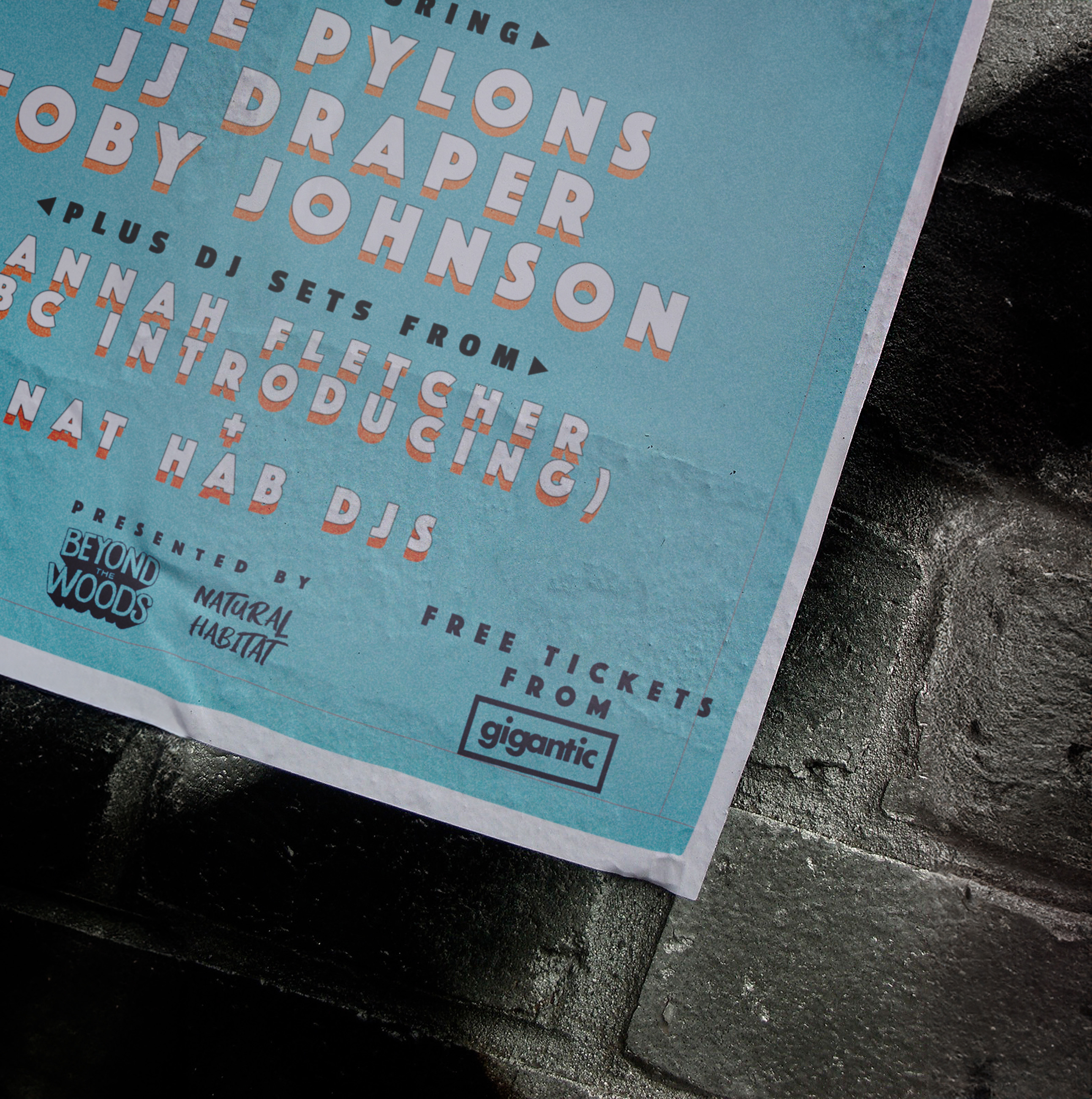 Partial view of a blue event poster listing musical acts including The Pylons, JJ Draper, Toby Johnson, and DJ sets from Hannah Fletcher and Nat Hab DJs, presented by Beyond the Woods and Natural Habitat, with free tickets from Gigantic.