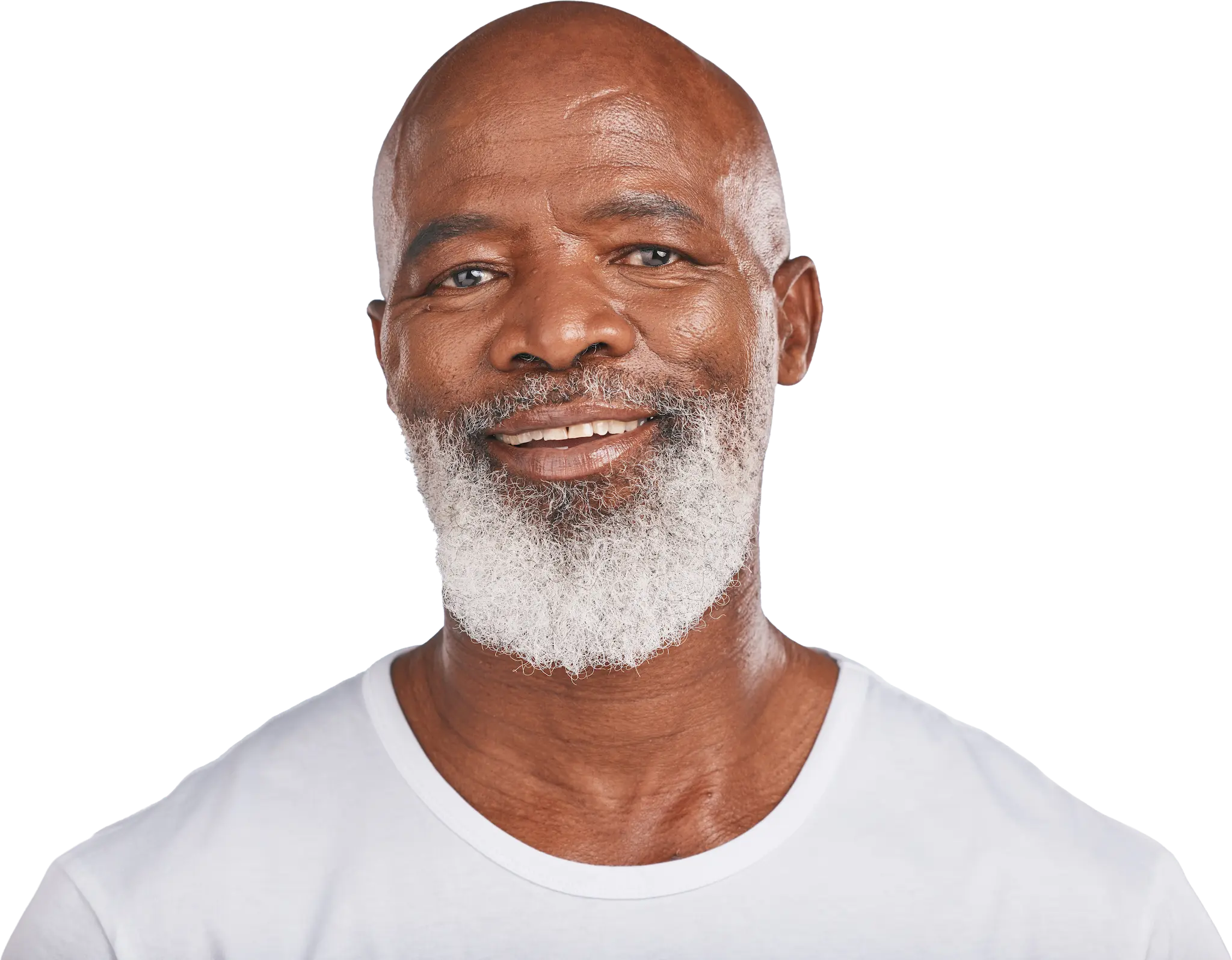 Smiling bald man with a full white beard wearing a white t-shirt.