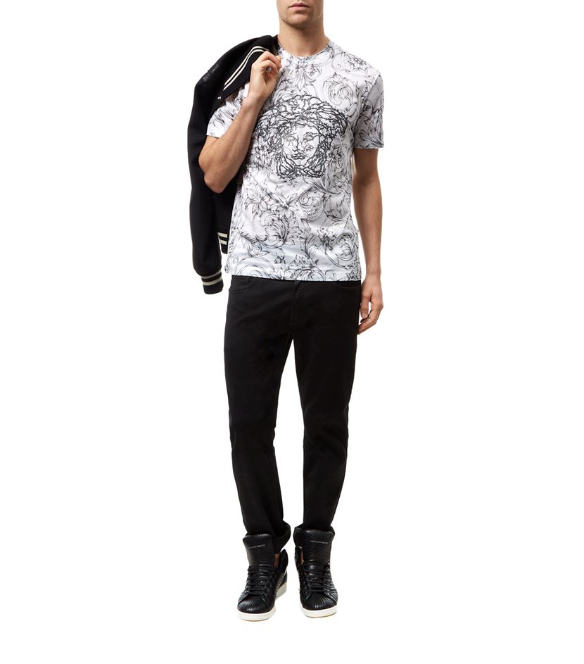 Versace designer t shirts with bold prints, glamorous style and luxurious fabrics, an iconic clothing brand in the fashion industry.