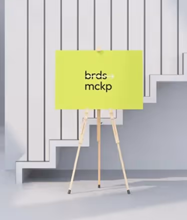 Yellow sign on a wooden easel with text 'brds mckp' in black, set against a backdrop of white stairs with gray shadows.