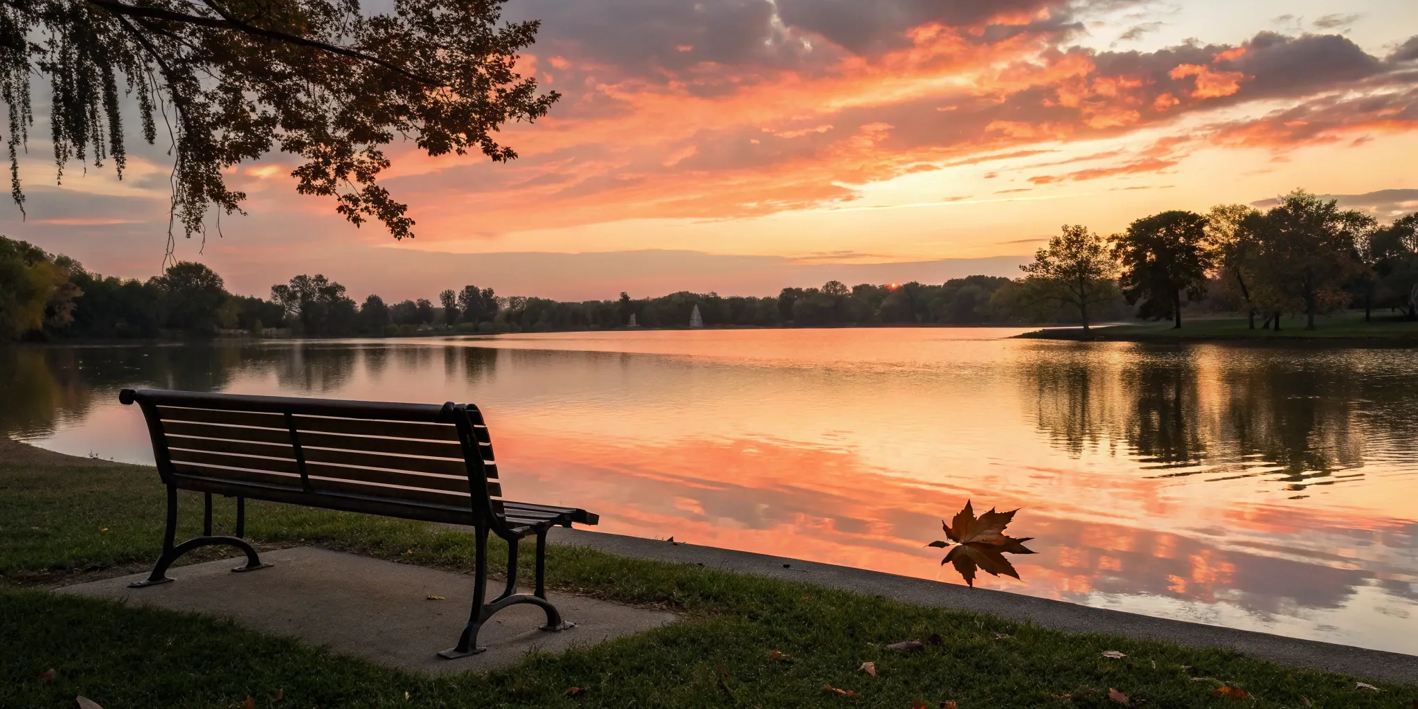 A quiet park bench at sunset, a peaceful setting for the best therapy for breakup recovery.