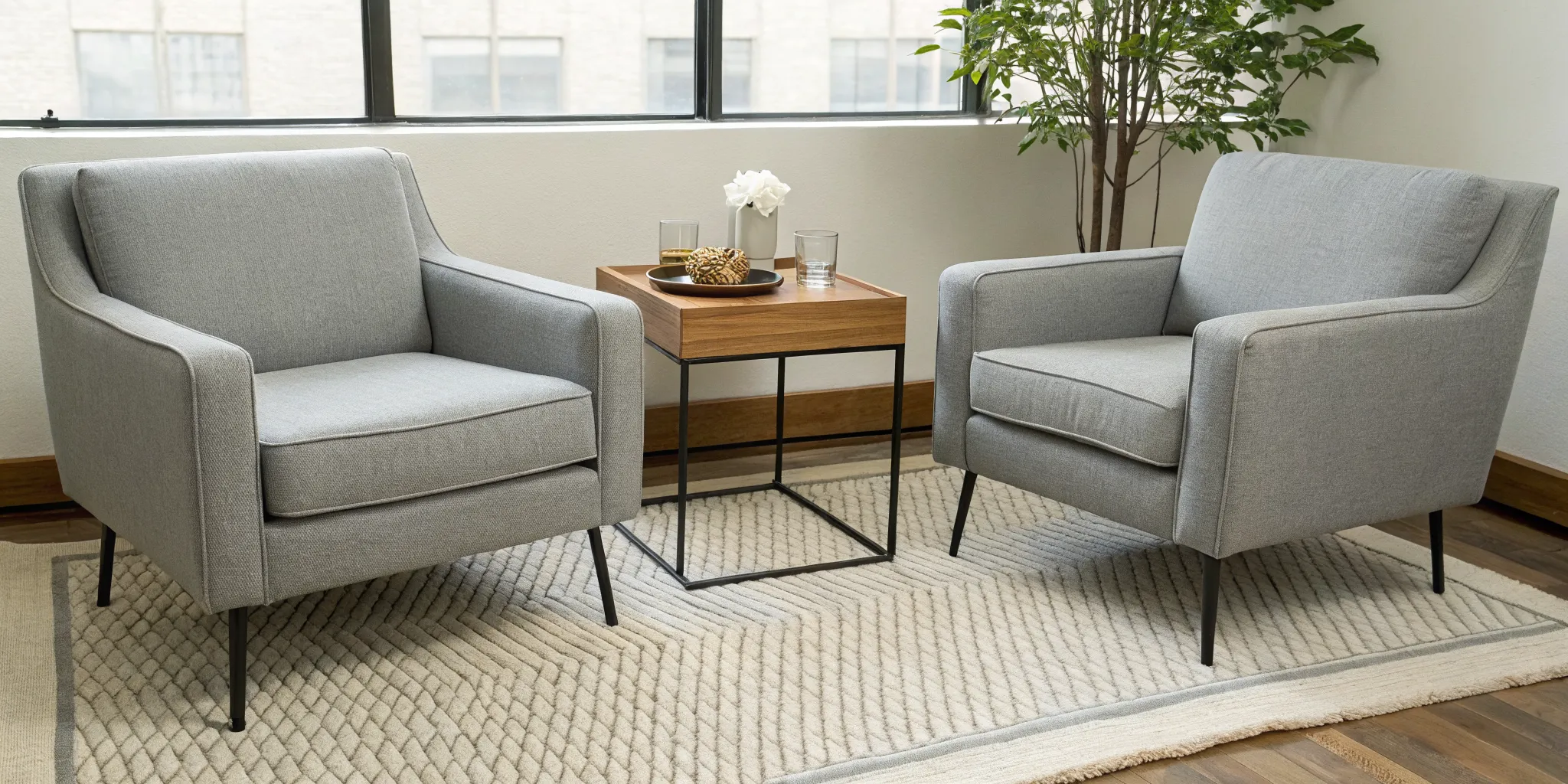 Two armchairs separated by a table, a sign of distance in a relationship that needs marriage counseling.