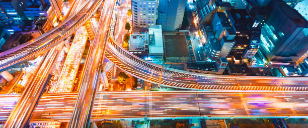 Busy city traffic at an urban intersection monitored for traffic data