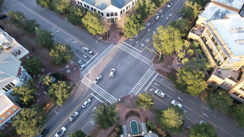 Aerial drone view of a roadway showing FusionSensor deployment context where the team meets agencies in the field