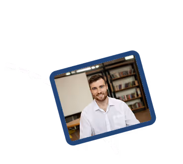 This image shows a tilted photo of a smiling young man with a beard wearing a white shirt, positioned against a dark navy blue background with a white dashed line design element running diagonally across the composition.