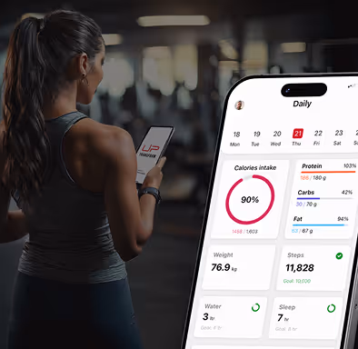 Woman in workout attire holding smartphone with nutrition and fitness app showing daily calorie intake, macros, weight, steps, water, and sleep data.